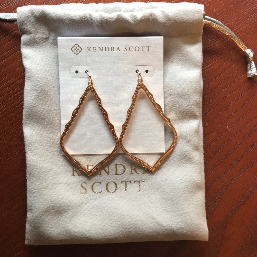 Golden Kendra Scott earrings